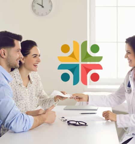 A happy couple at a consultation with a doctor for in vitro fertilization