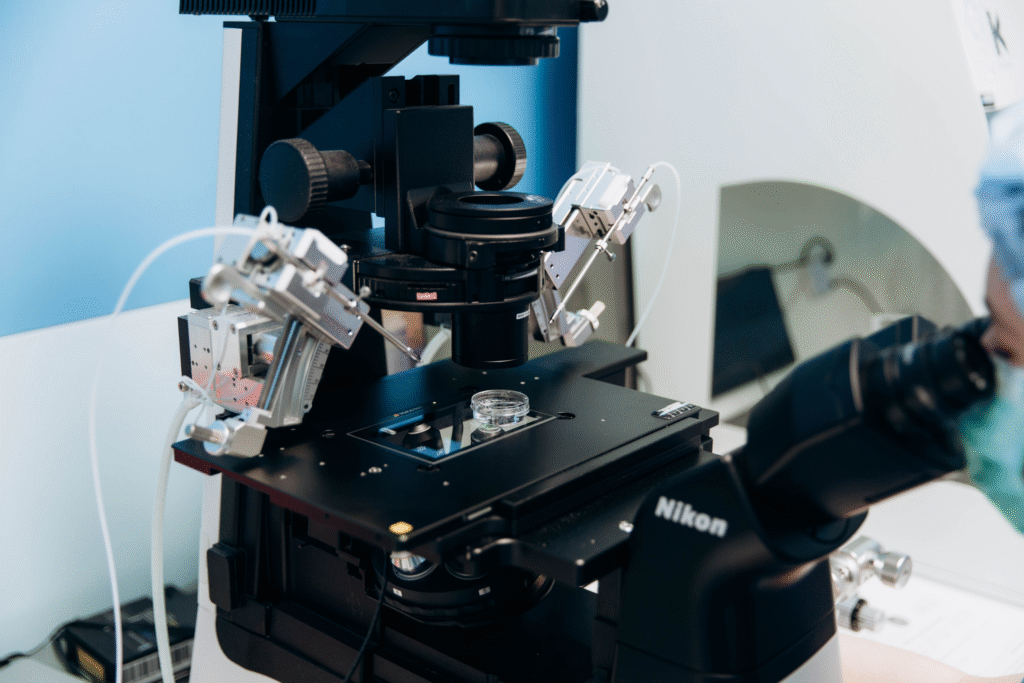 Microscopic view of the ICSI procedure, injecting a sperm cell into an egg at IVMED Fertility Clinic Ukraine